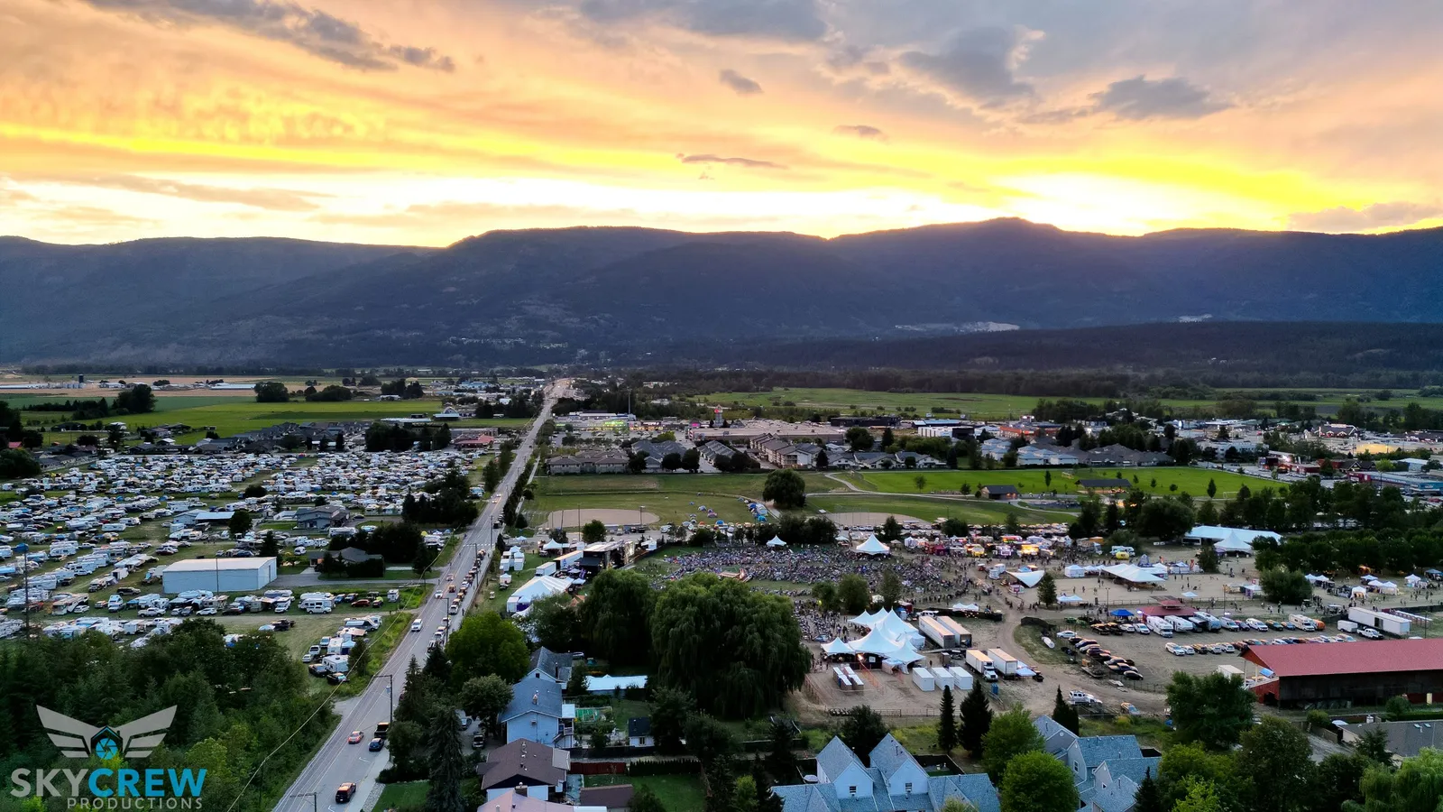 The Salmon Arm fairgrounds from the air at sunset, the festival’s tents beside the campground